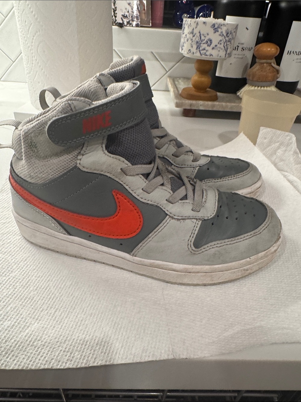Nike Kids High-Top Sneakers in Gray with Orange Swoosh